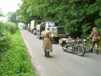 WW2 military vehicles on The Street