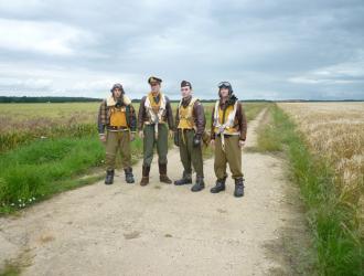 USAAF personnel in authentic WW2 uniforms on the airfield