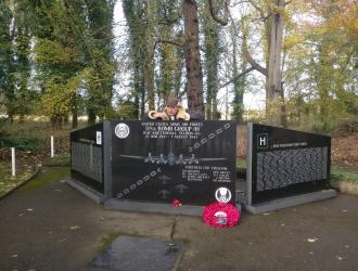 Tony Goff giving information on one of the names on the memorial